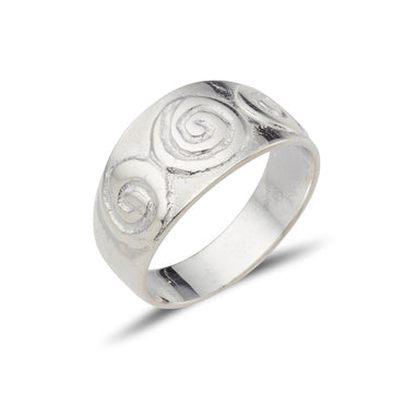 celtic design tripple newgrange spiral embossed on a tappered band