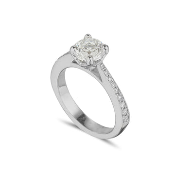 platinum diamond solitaire with with a d colour round brilliant cut certified diamond and tappered diamond set band