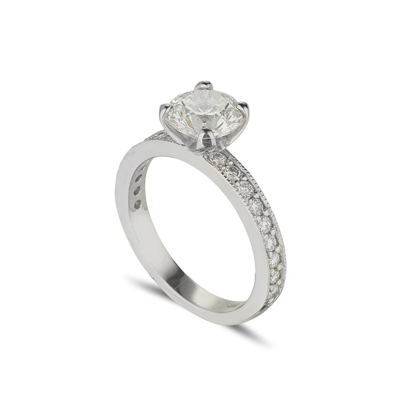 platinum diamond solitaire ring with diamond set shoulders