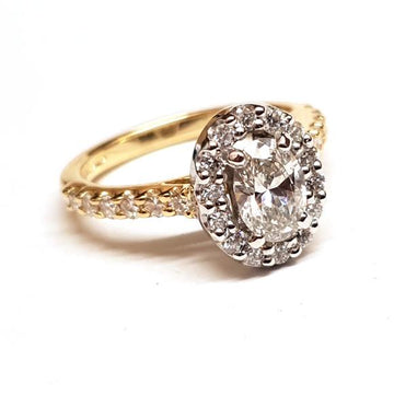 18ct yellow gold diamond oval halo engagement ring with diamond set shoulders