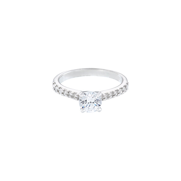 18ct white gold diamond solitaire ring with the round diamond set in 4 claws, there is also a claw set diamond band to add to the sparkle