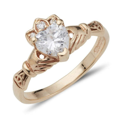 9ct yellow gold ladies birthstone claddagh ring with heart shaped stone in the centre and small round stones in the crown