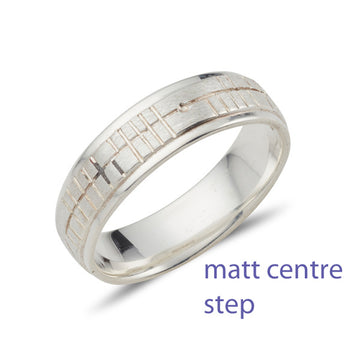 18ct white gold step wedding band, the centre is slightly raised, the centre has a matt finish which is engraved with celtic ogham script, the edges are polished