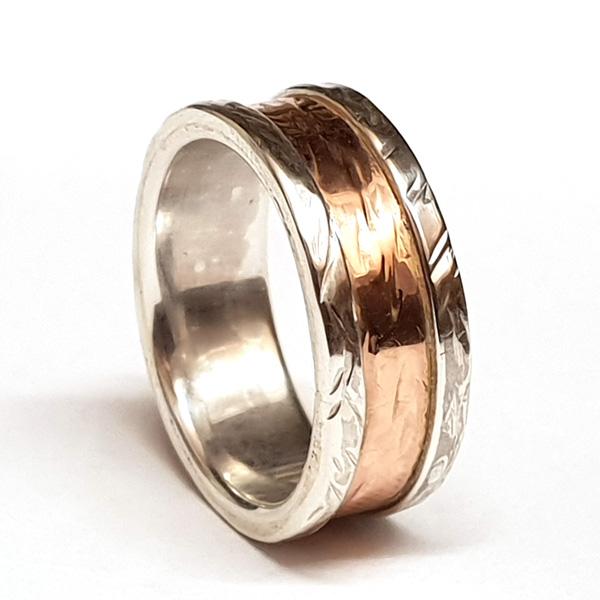 silver and gold wide wedding ring
