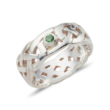 sterling silver celtic design ring with a fully pierced out celtic pattern, ideal for both male an female, it is 7.5mm wide this ring is set in the centre with a bezel set green cubic zirconia
