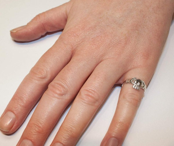 madium sized classic claddagh ring as worn by a lady