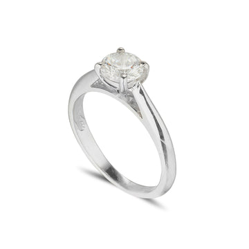 18ct white gold diamond solitaire engagement ring with tapered shoulders and a round diamond set in a 4 claw setting