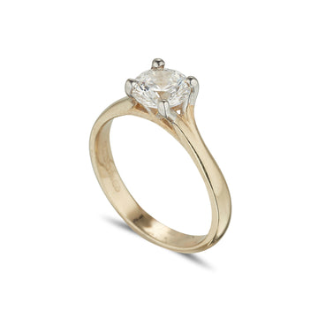 18ct yellow gold diamond solitaire ring with a round brilliant cut diamond set in white gold