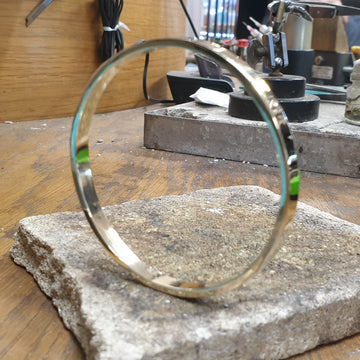 yellow gold slave bangle recycled from a clients old scrap gold