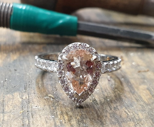 18ct white gold pear shaped cluster with centre stone morganite and round brilliant cut diamonds surrounding it