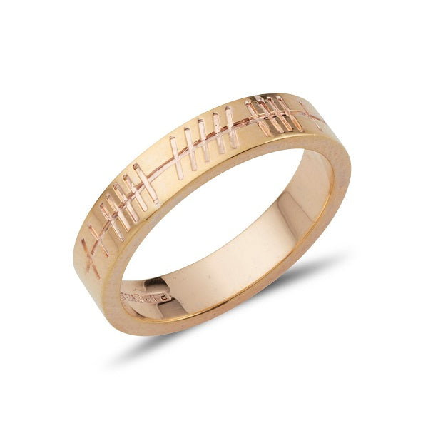 yellow gold narrow flat weddding band with personalised ogham inscription