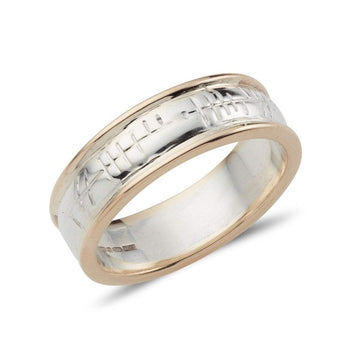 2 colour gold ogham wedding band, the centre part is white and the outer rims are in yellow gold