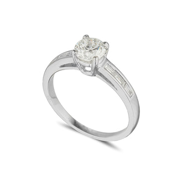 Platinum Solitaire ring 4 claw with baguette set shoulders