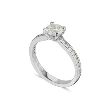 platinum diamond solitaire ring with channel set soulders