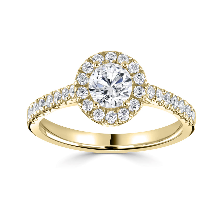 18ct gold halo engagement ring with fish tail diamond set shoulders yellow gold