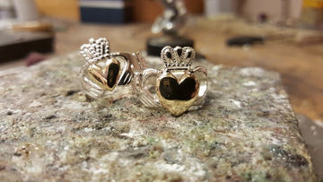 sterling silver claddagh ring with yellow gold heart