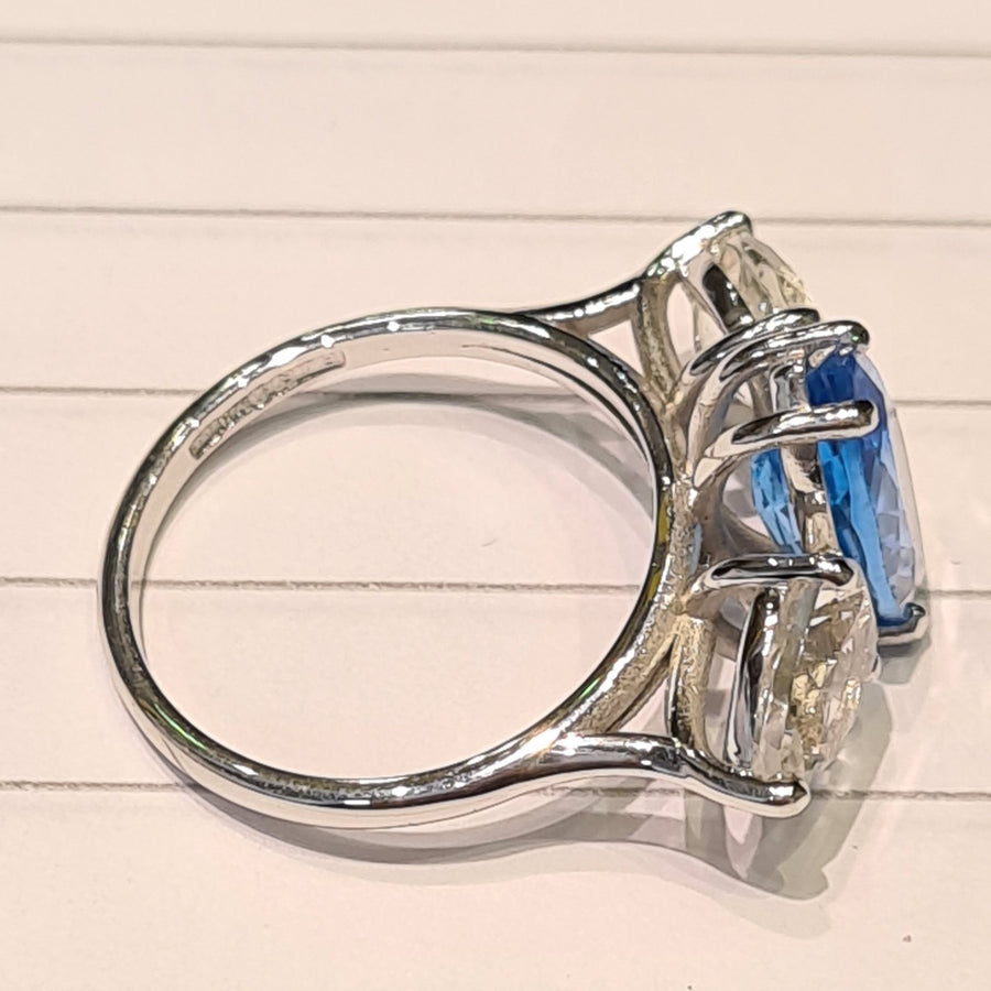 Blue topaz and Aqua marine 3 stone dress ring
