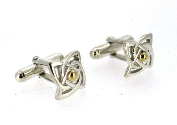 sterling silver celtic design cuff links with a curvey square shape and yellow gold detail in the centre, the cufflink has a torpedo fitting