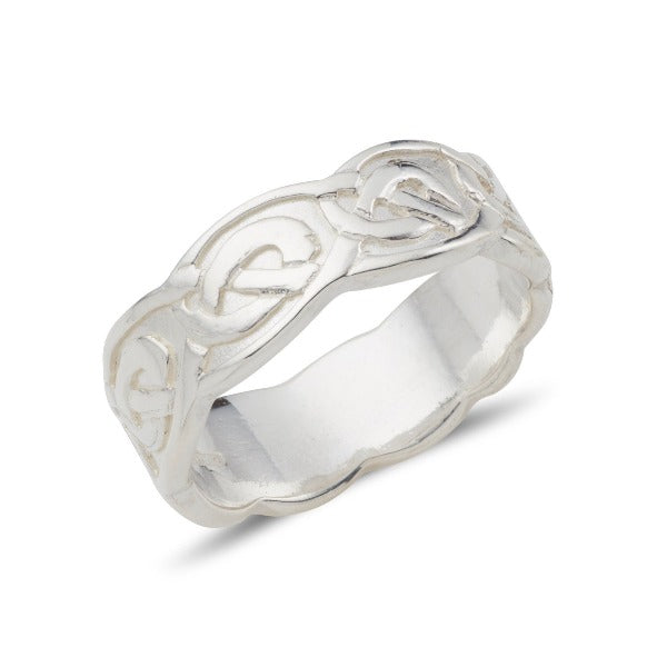 sterling silver celtic design ring with an embossed pattern and a wavy edge, this is the ladies 7mm version