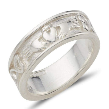 This piece is a Gents ring that measures 8mm wide. This mens sterling silver claddagh ring has the claddagh to the front and a celtic pattern around the rest of the ring