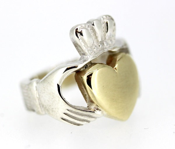 sterling silver gents heavy solid claddagh ring with gold heart view from the side to show the thickness