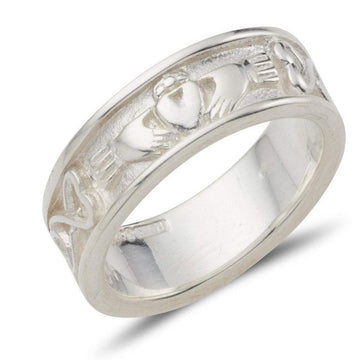 This ladies sterling silver claddagh band has the claddagh to the front and a celtic pattern around the rest of the ring, it is 6mm wide