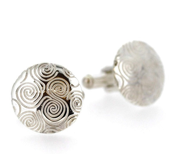 sterling silver newgrange spiral cufflinks, these are round in shape with lots of spirals