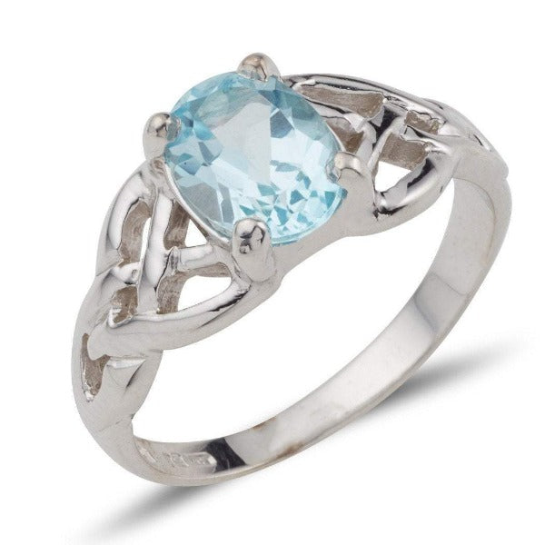 white gold twin celtic trinity triskle knot ring set with a 8mm * 6mm oval brilliant cut blue topaz within 4 claws