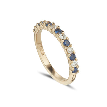 18ct yellow gold sapphire and diamond claw set eternity ring